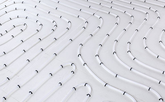 underfloor heating wires on a white floor
