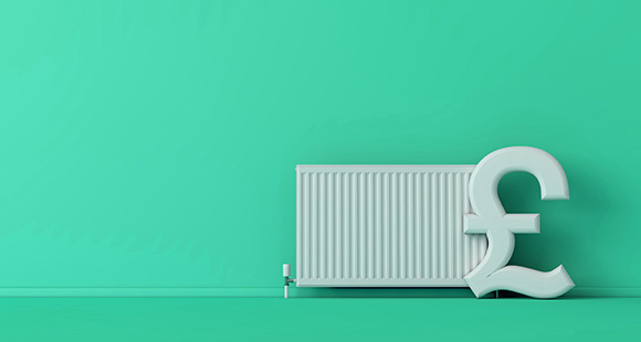 a pound sterling symbol next to a radiator in a green room